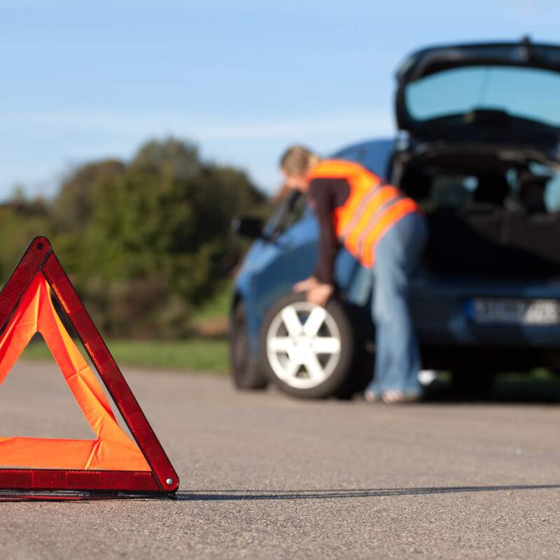 How far should you place a warning triangle from your car